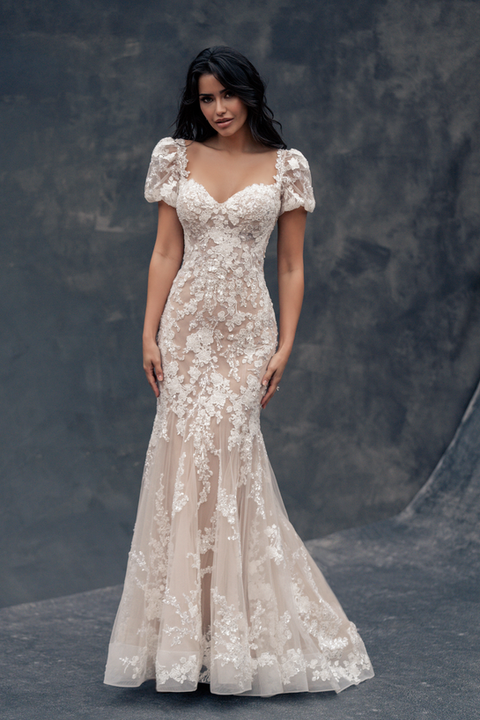 indoor photo of woman wearing white allure couture designer wedding dress