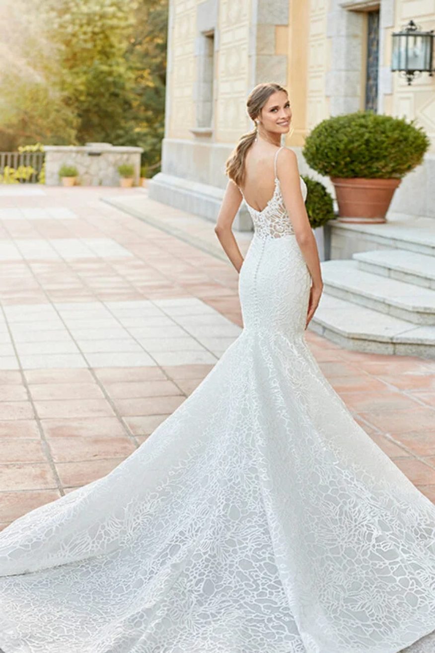 woman wearing rosa clara designer wedding dress outdoors